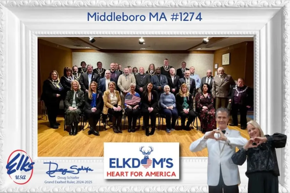Members of Middleboro Elks Lodge #1274 seated together in the lodge hall